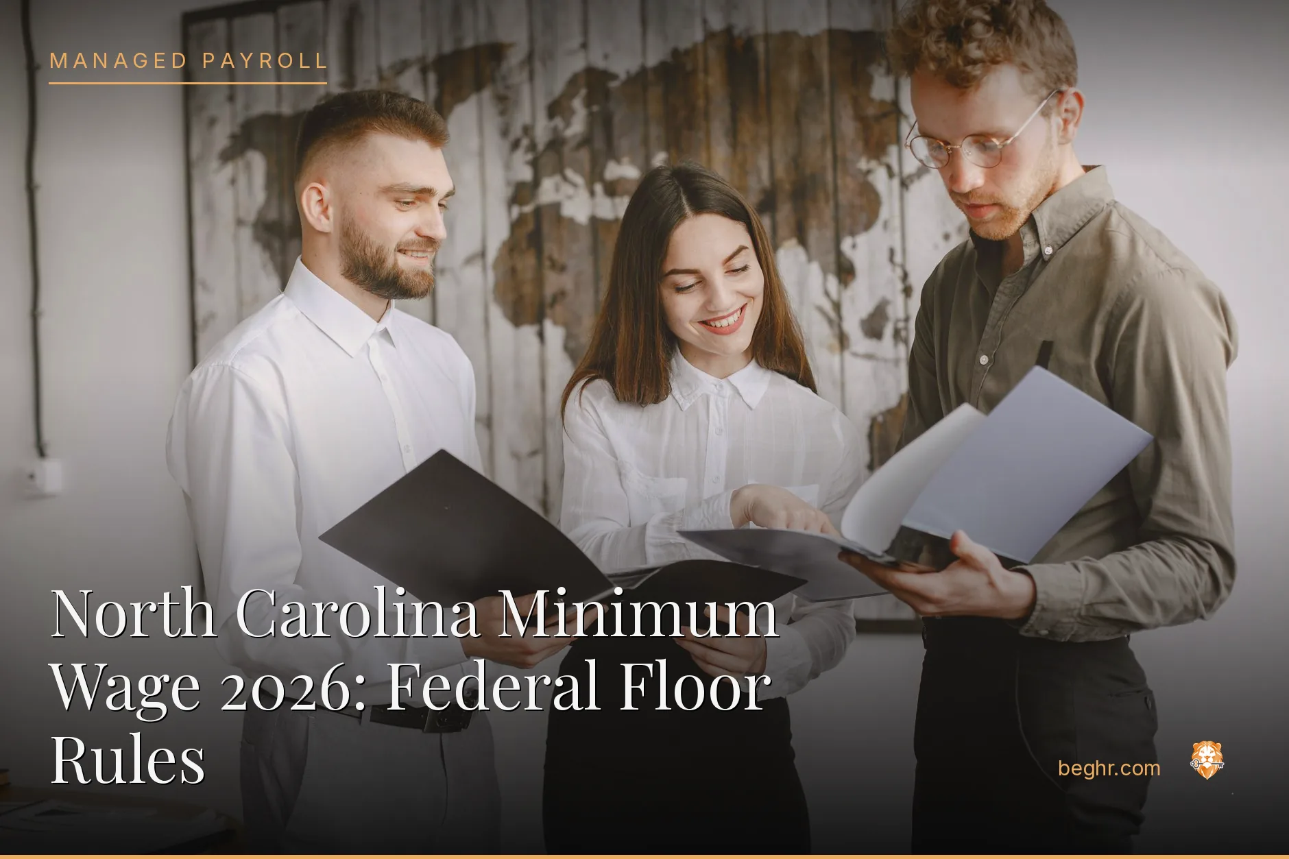 Business professionals reviewing payroll and HR documents in a bright modern office