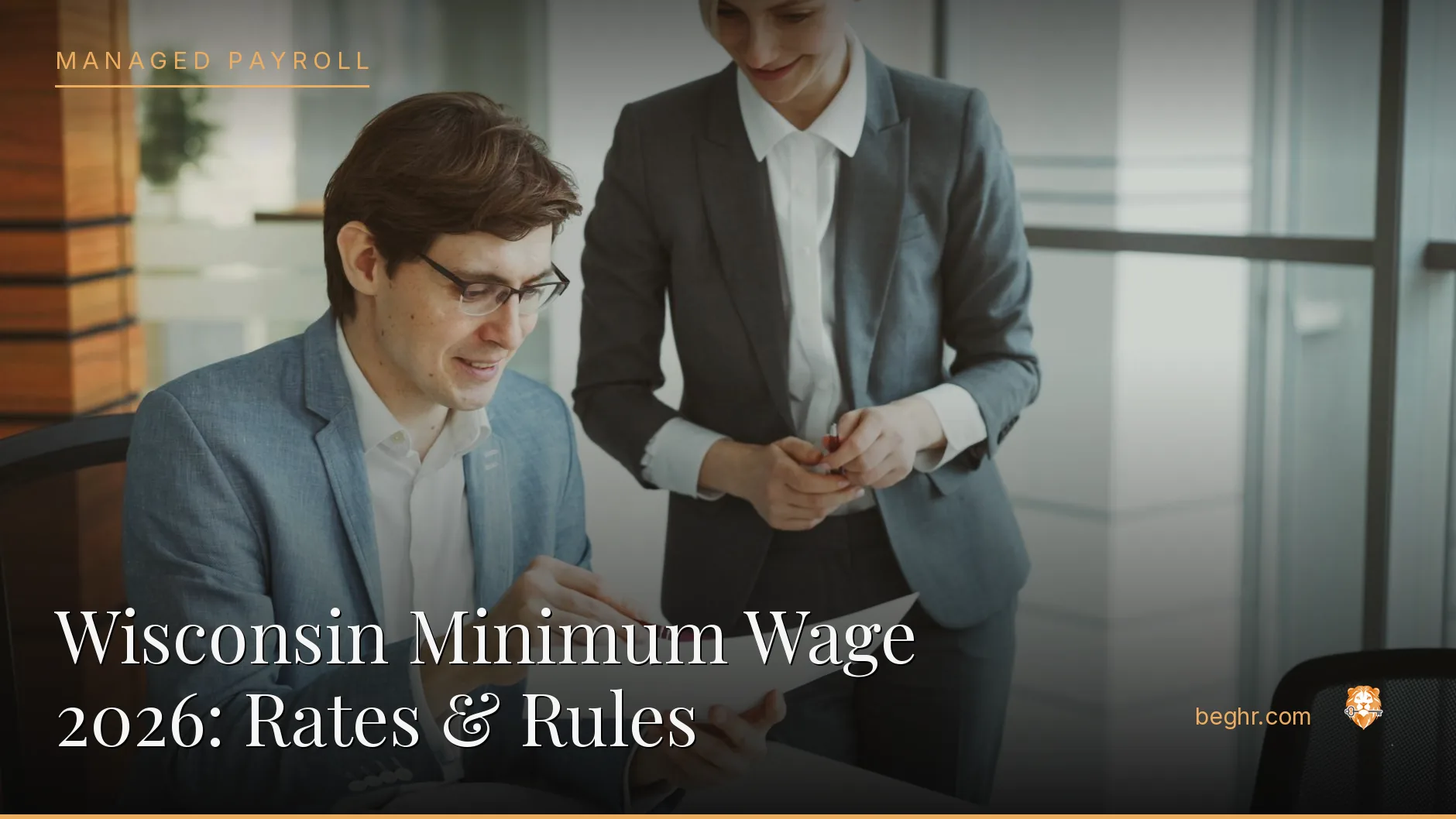 Business professionals reviewing payroll and HR documents in a bright modern office