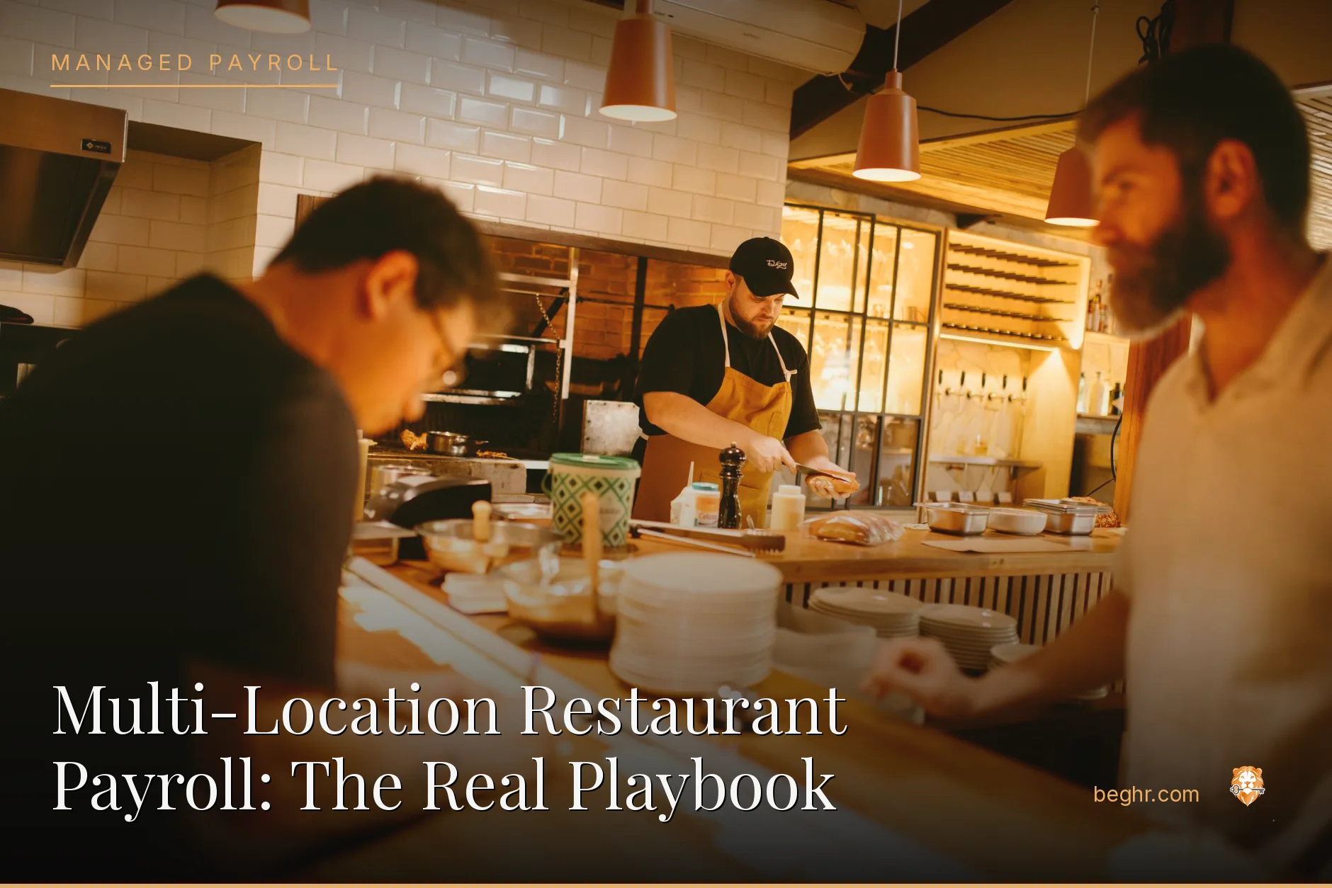 A busy modern restaurant kitchen with chefs and staff working the line