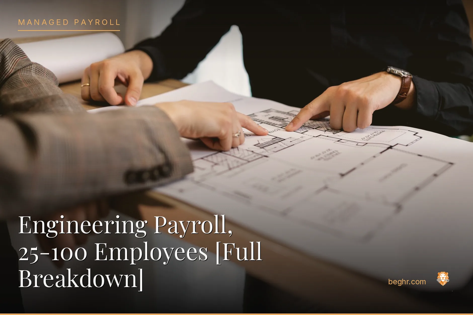 Engineers reviewing technical drawings in a modern office