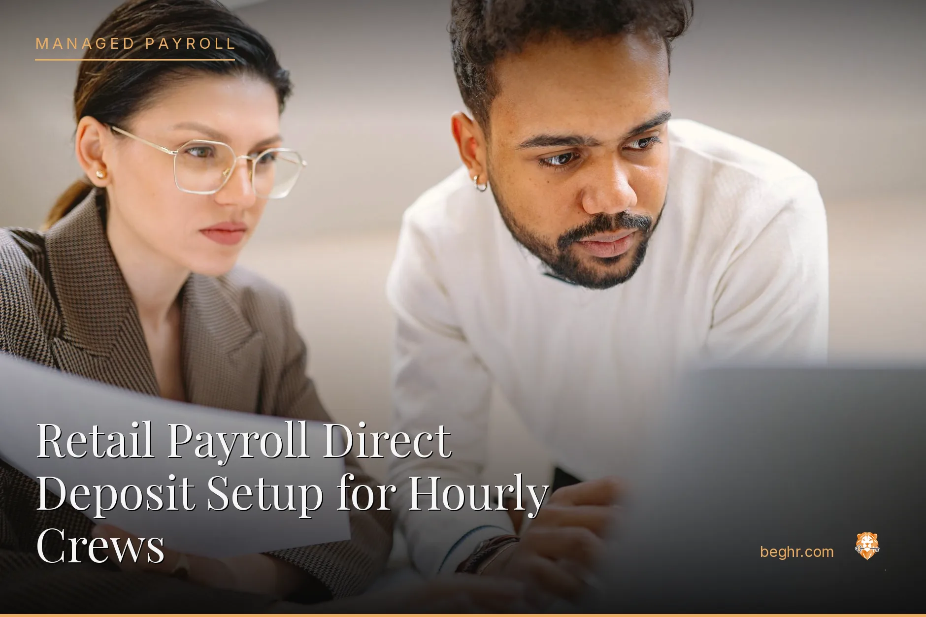 Business professionals reviewing payroll and HR documents in a bright modern office