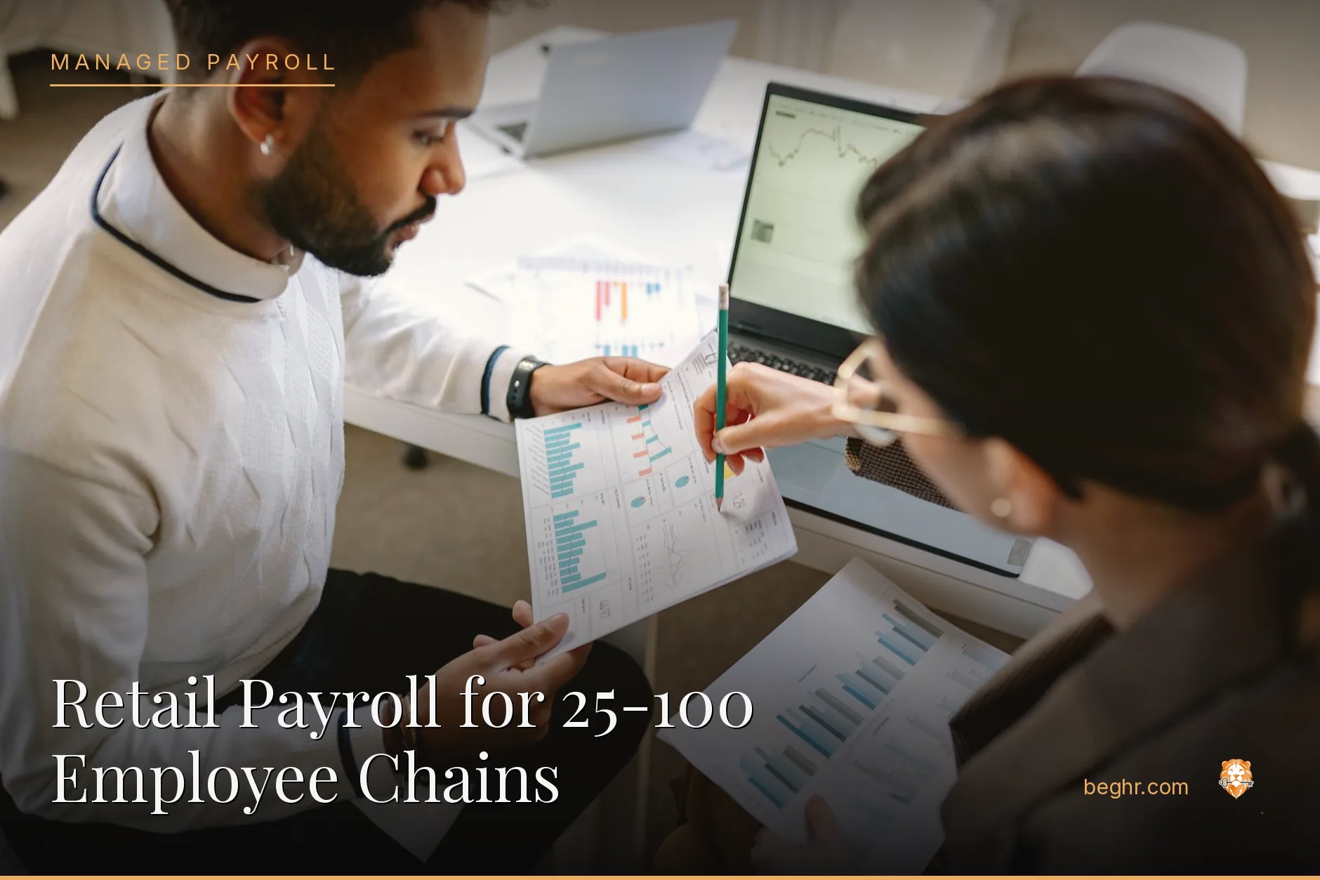 Business professionals reviewing payroll and HR documents in a bright modern office