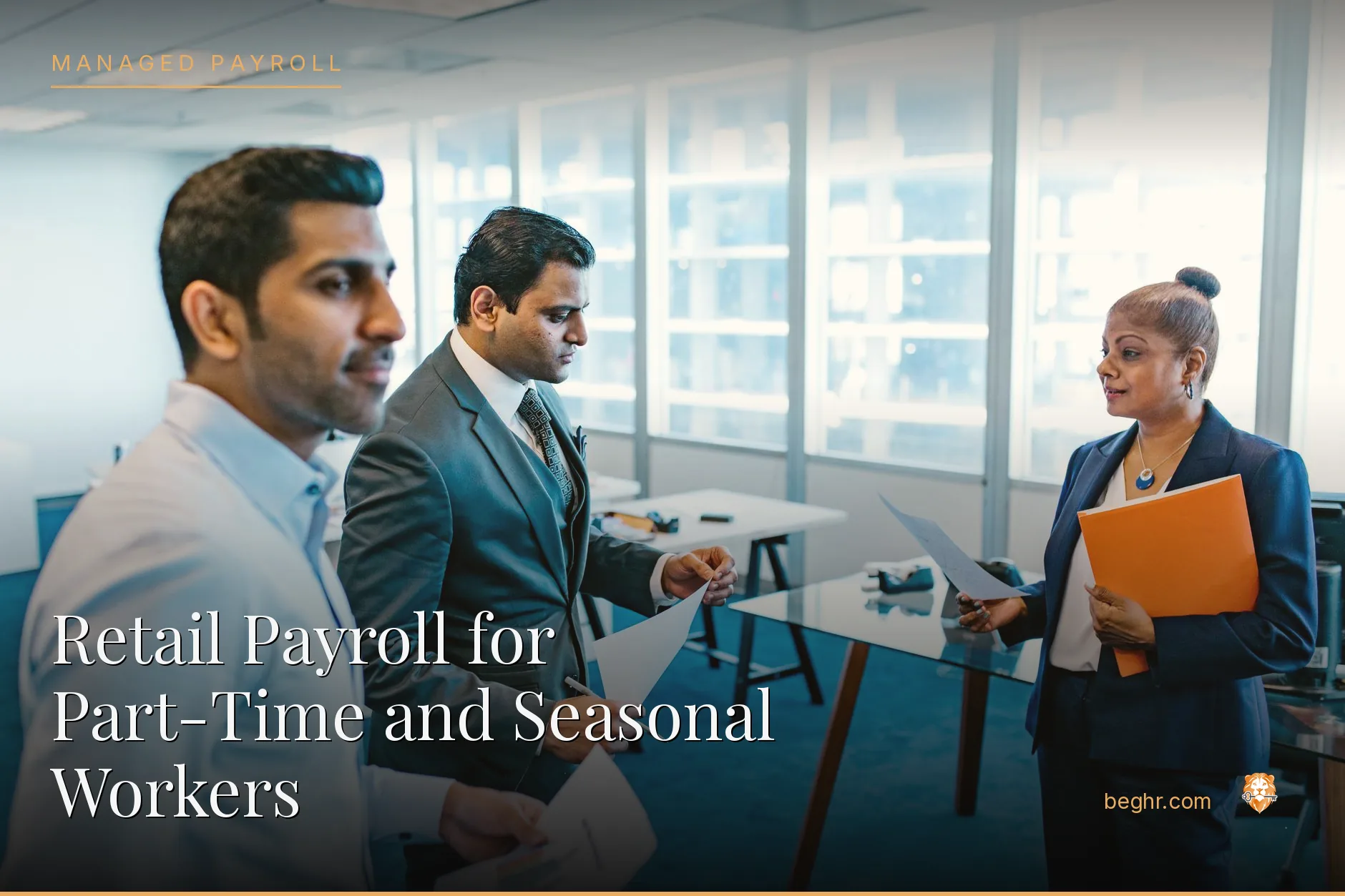 Business professionals reviewing payroll and HR documents in a bright modern office