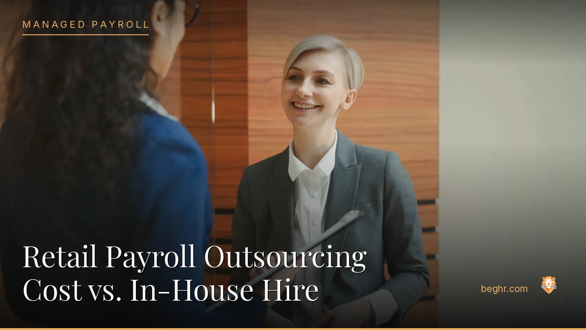 Business professionals reviewing payroll and HR documents in a bright modern office