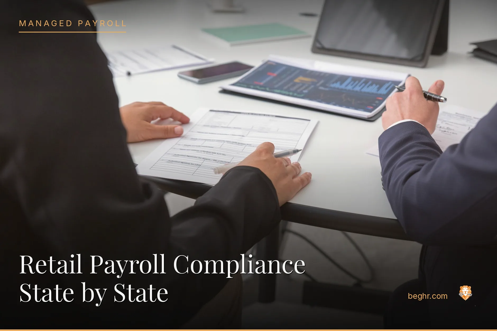 Business professionals reviewing payroll and HR documents in a bright modern office