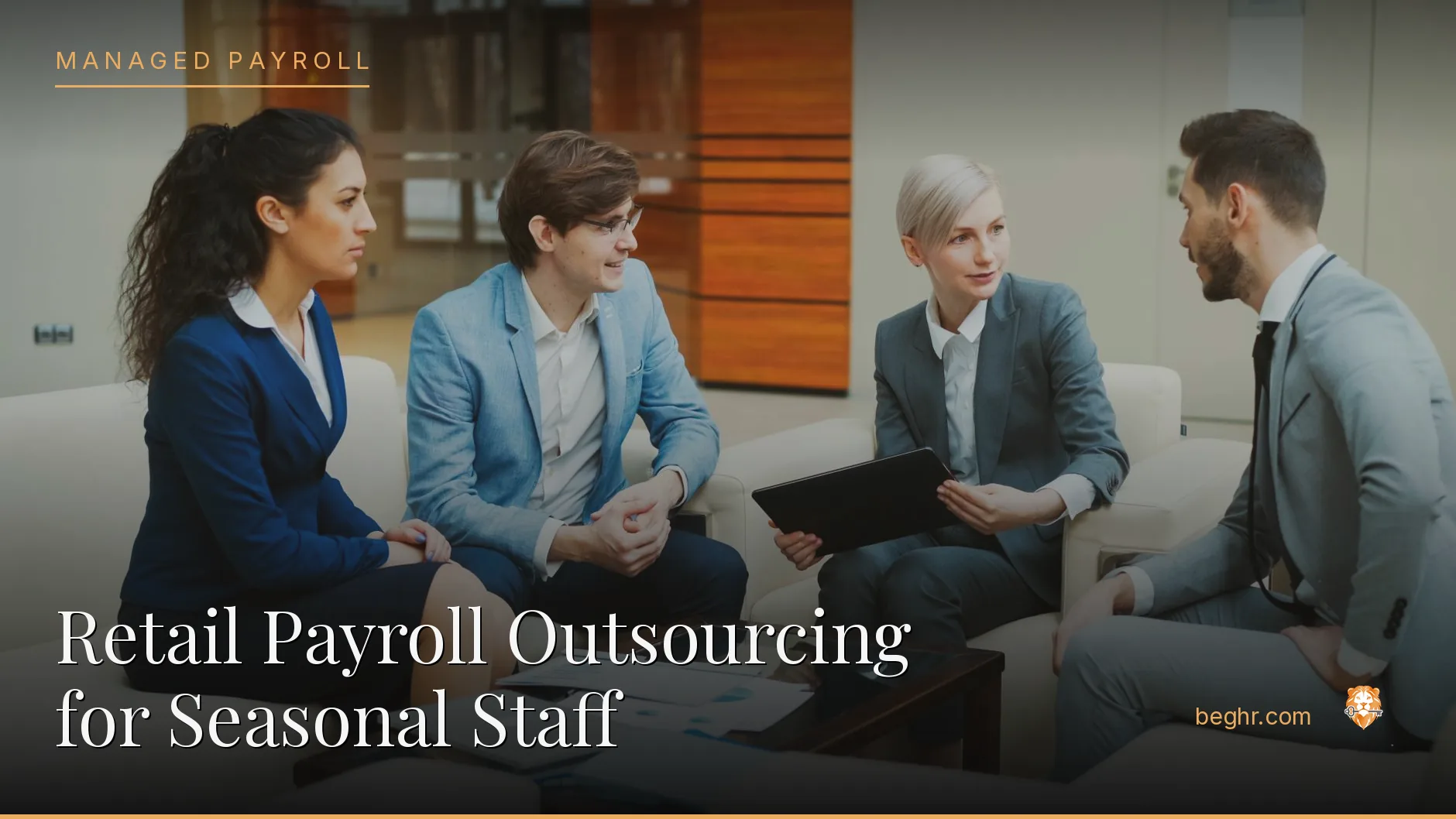 Business professionals reviewing payroll and HR documents in a bright modern office