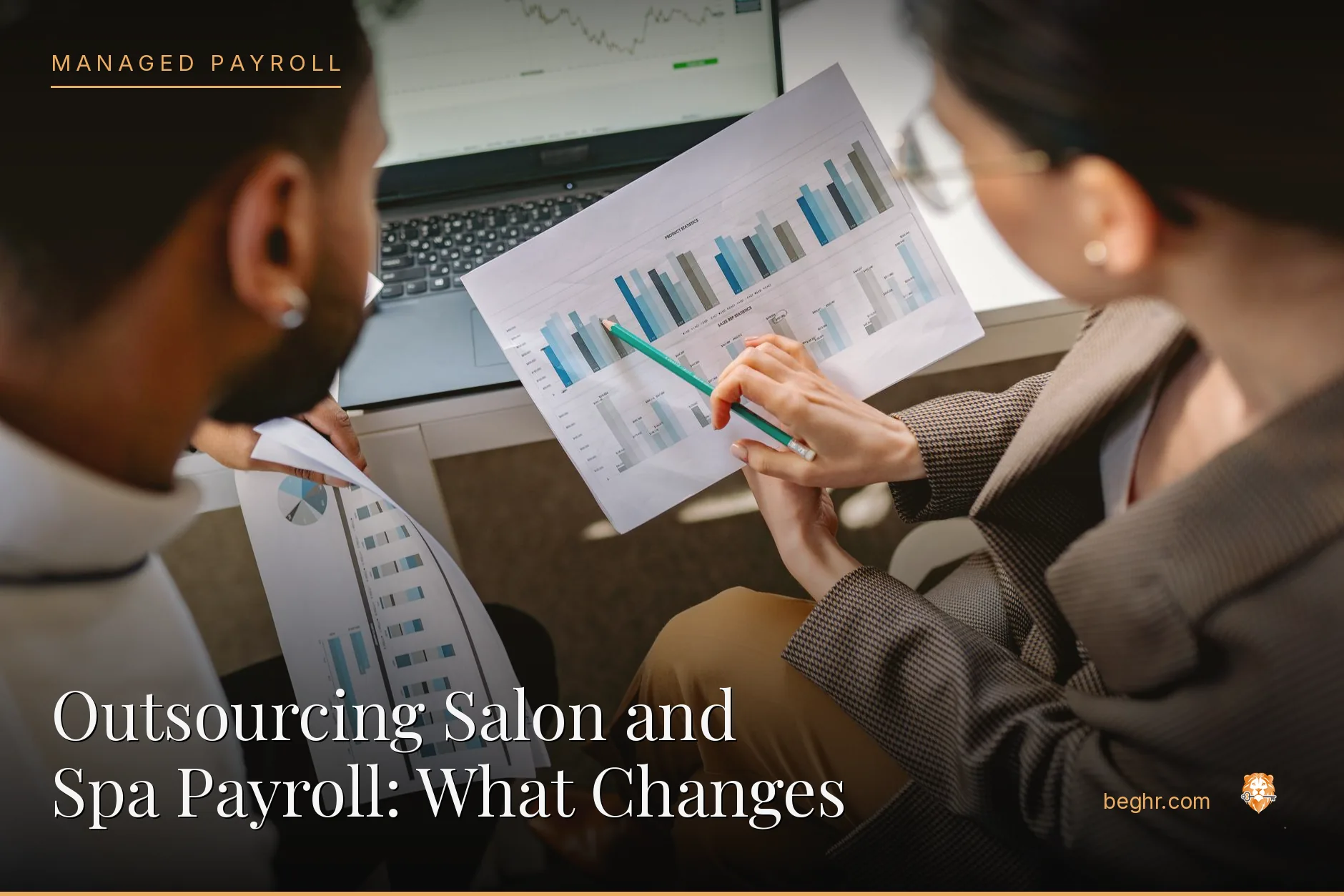 Business professionals reviewing payroll and HR documents in a bright modern office