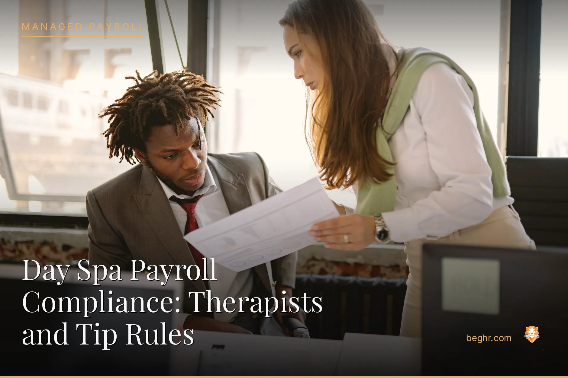 Business professionals reviewing payroll and HR documents in a bright modern office