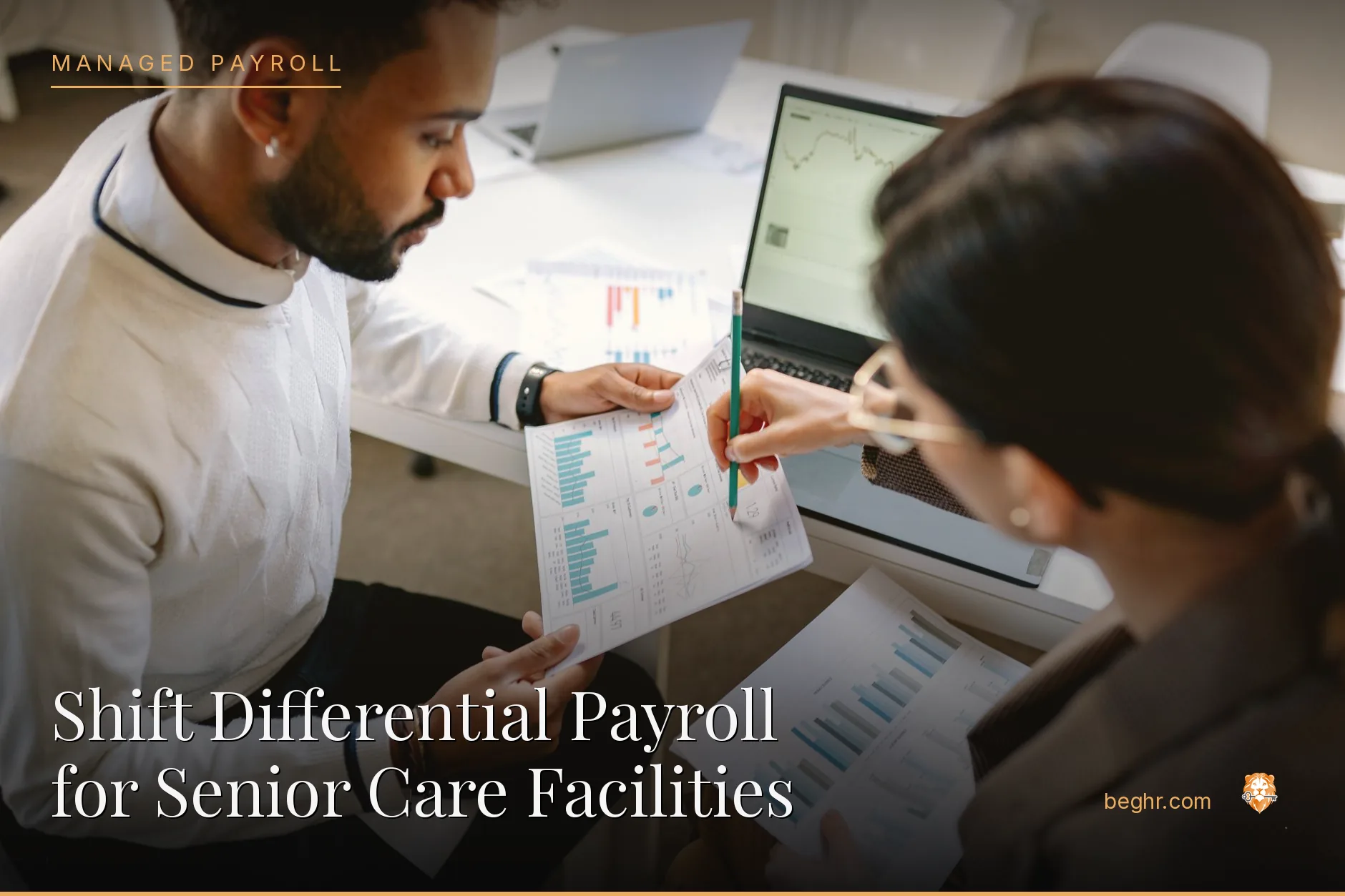 Business professionals reviewing payroll and HR documents in a bright modern office