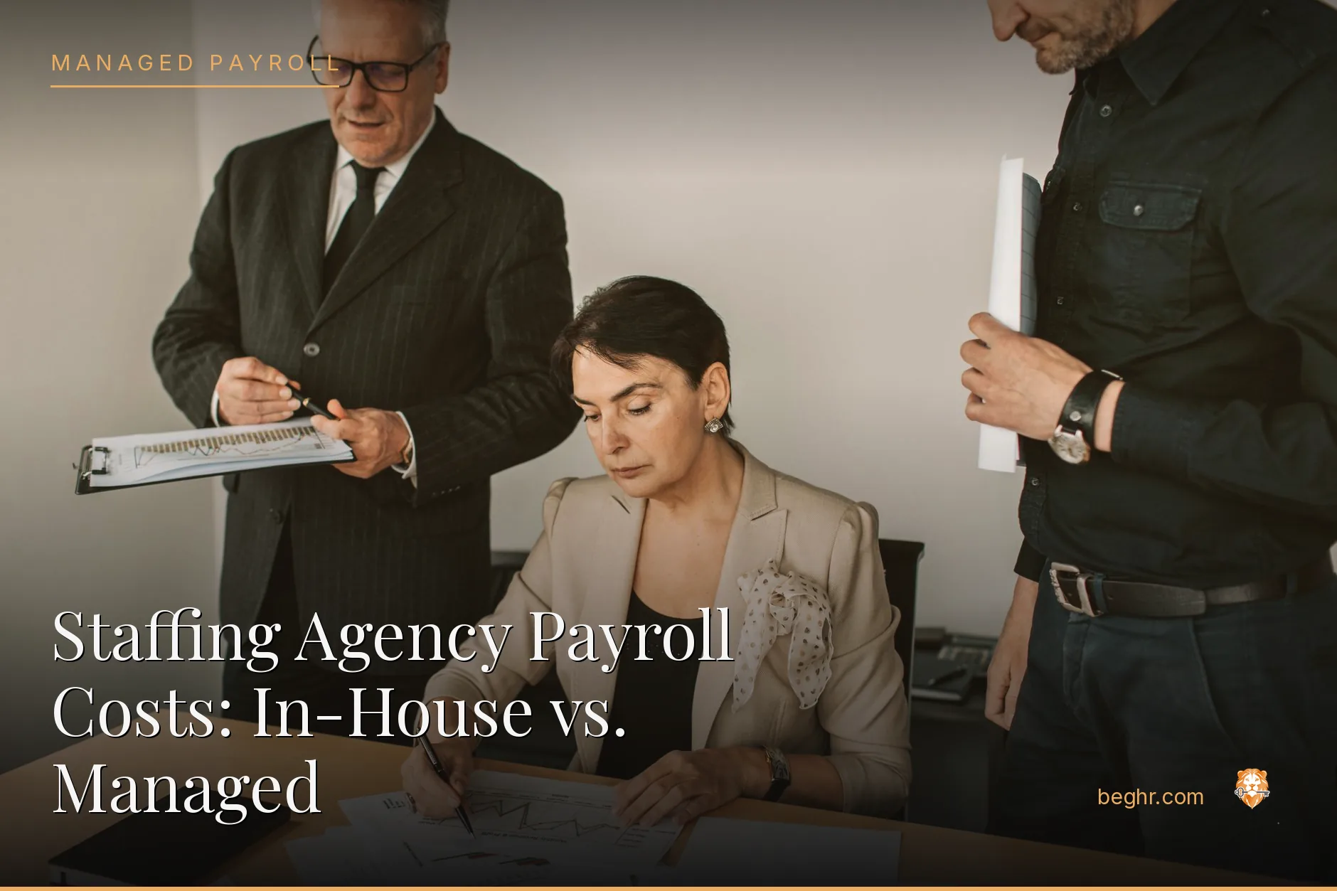 Business professionals reviewing payroll and HR documents in a bright modern office