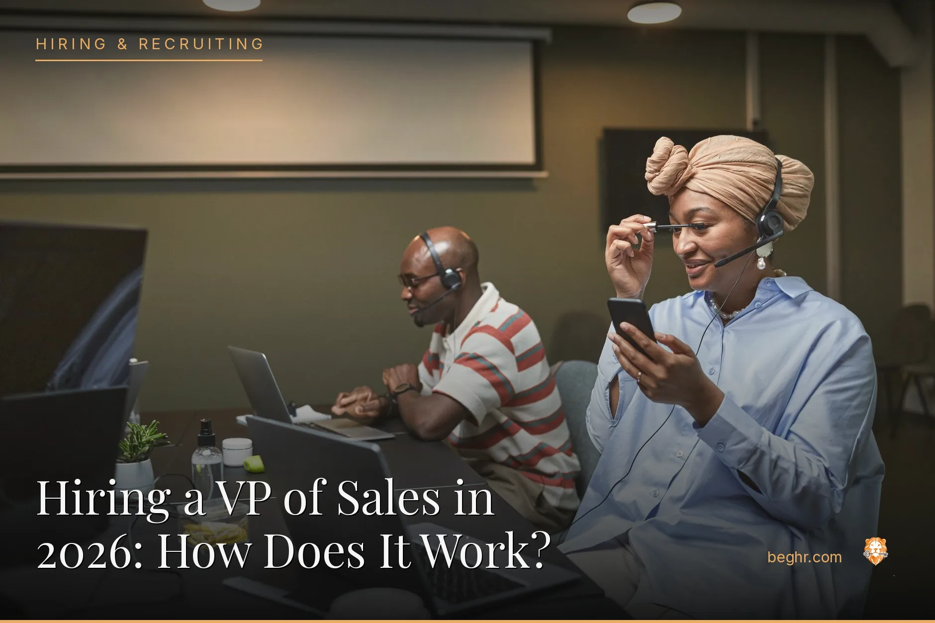 A sales team on calls and reviewing a pipeline in a modern office