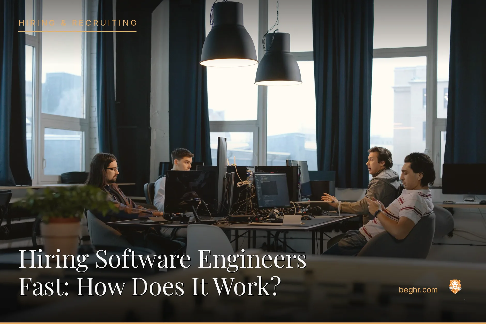 A modern tech office, software team collaborating at workstations